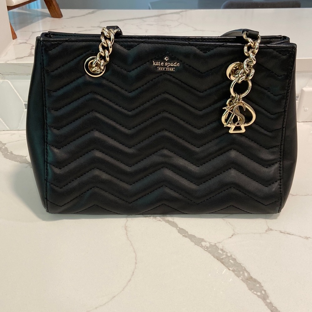 Leather Kate Spade Handbag in chevron pattern with Gold accents and pink lining